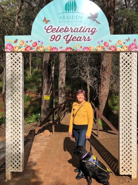 Lovely picture of Colleen at the entrance of Araluen Botinical Park