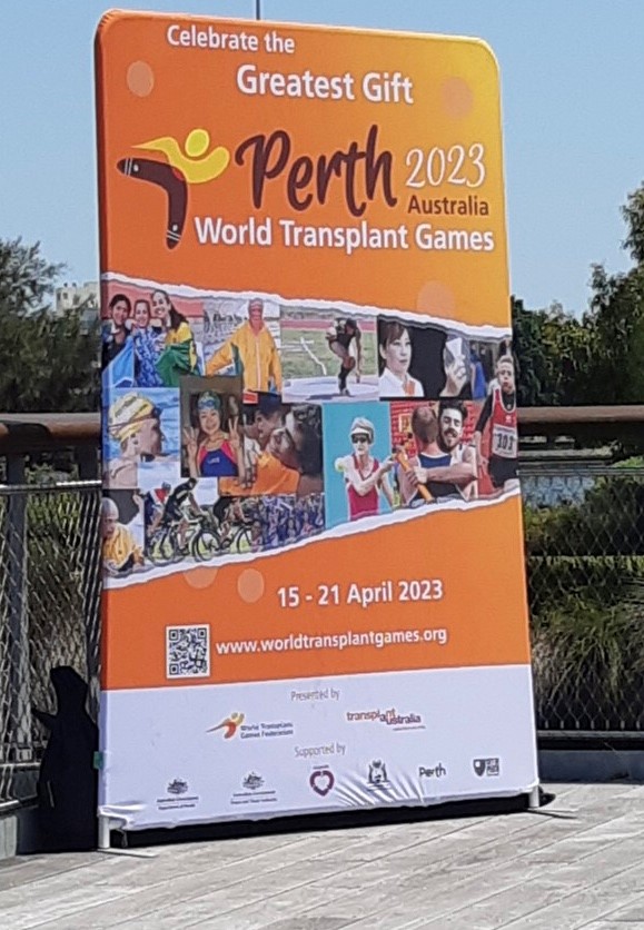 Picture of a large billboard with text "World Transplant Games 2023 coming to Perth".