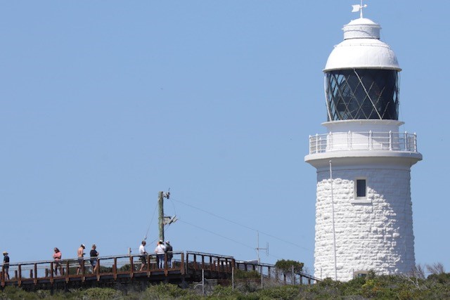 Picture of Cape Naturaliste lighthouse, a white lighthouse in front of a stunning blue sky.